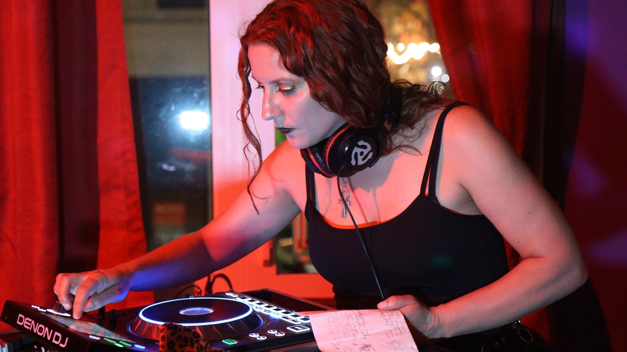 Siren (Marci), Assistant Director and DJ at Asylum Windsor, performing at an event
