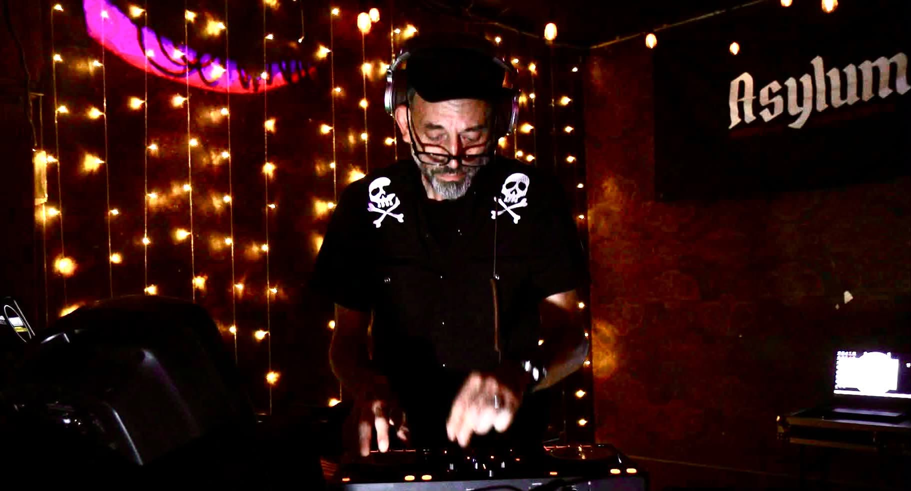 Liam Lux, DJ and advisor at Asylum Windsor, performing behind the decks